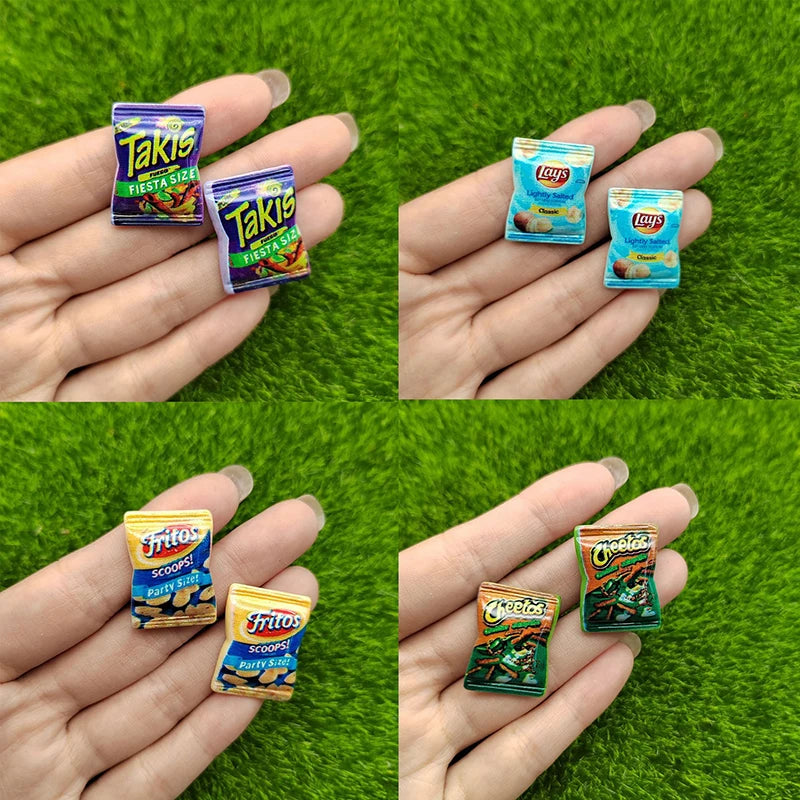 Collage of miniature snack packs held in a hand against a green grass background