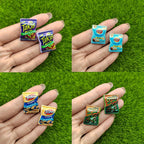 Collage of miniature snack packs held in a hand against a green grass background
