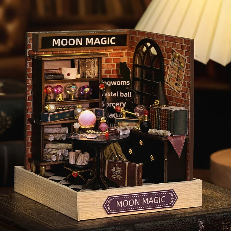 Miniature model of a magical shop named 'Moon Magic' with various mystical items.