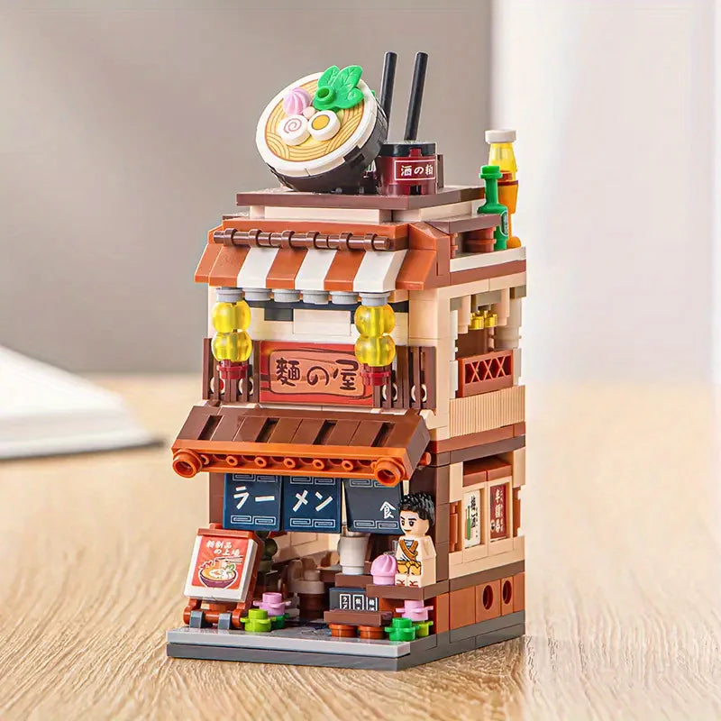 LEGO model of a Japanese ramen shop on a wooden surface