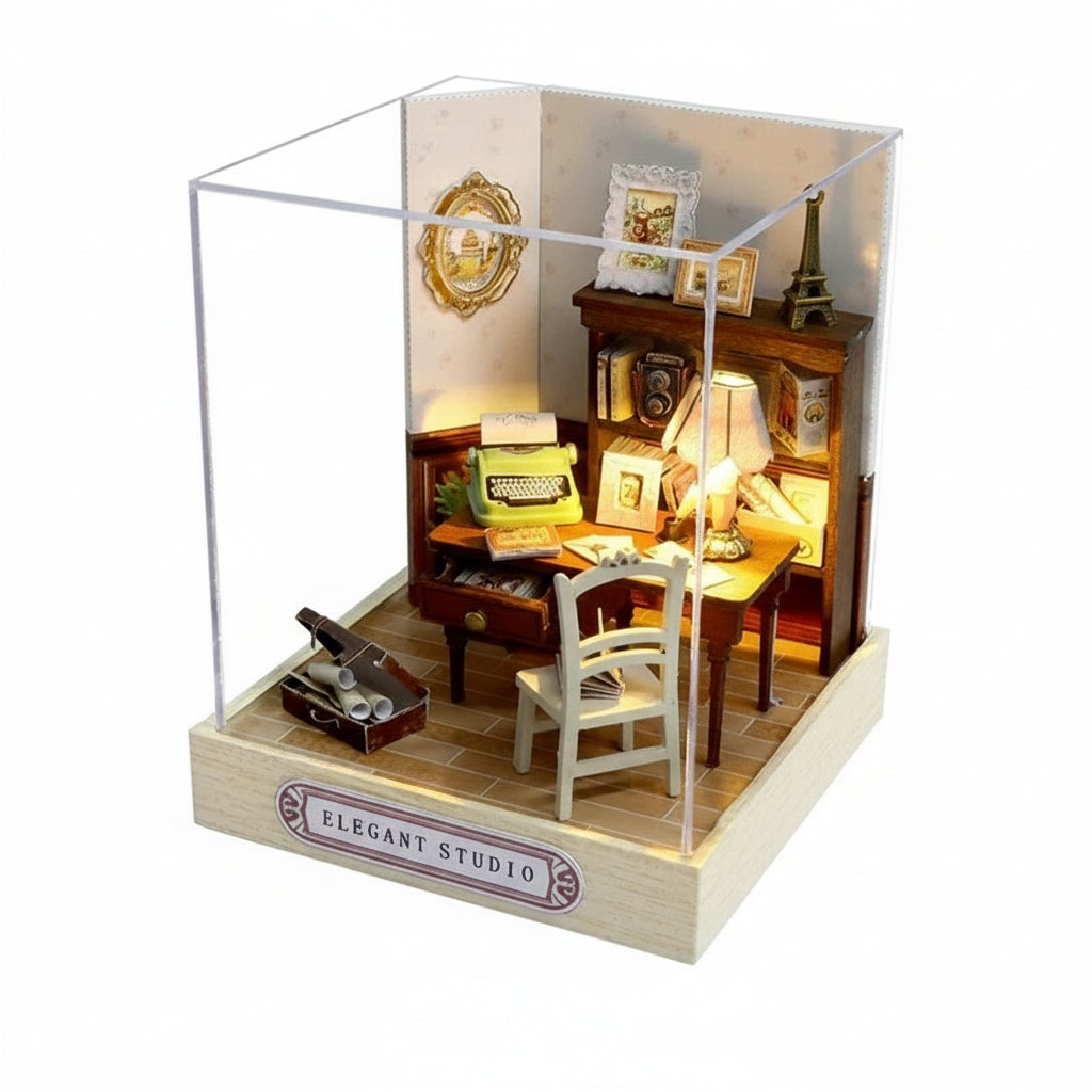 Miniature model of a study room with furniture and decor, enclosed in a glass case with dimensions indicated.
