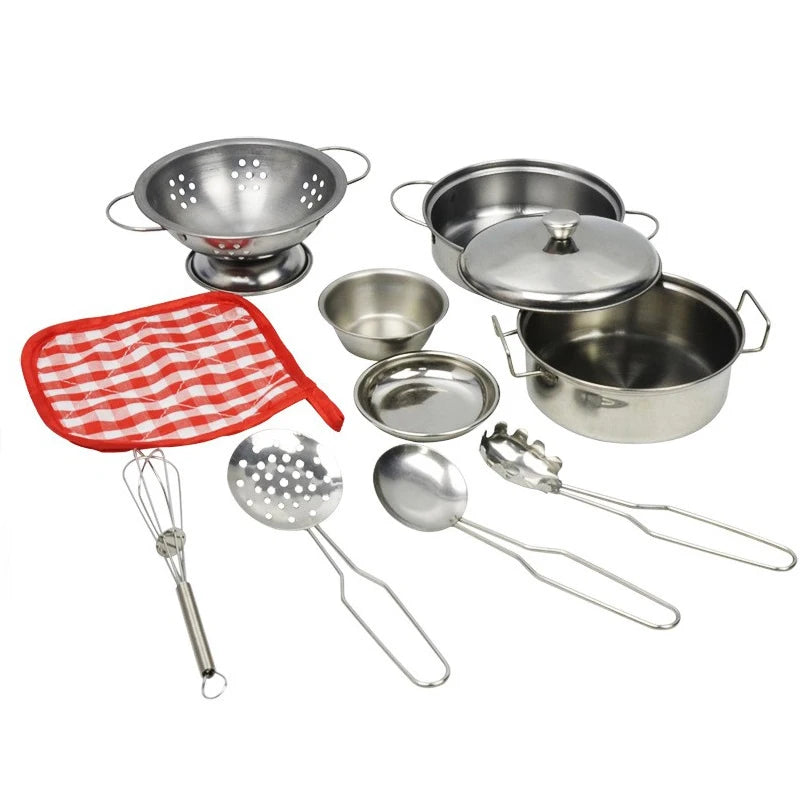 Collection of stainless steel cookware and utensils on a white background