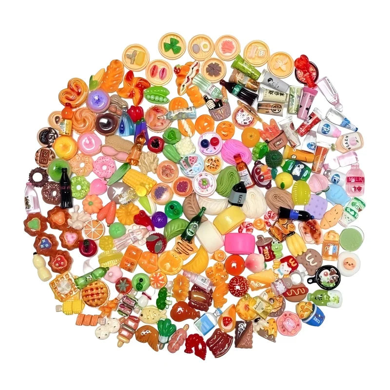 Assorted colorful miniature food items arranged in a circular pattern on a white background