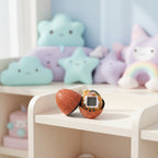 Basketball-shaped device with a screen on a white background