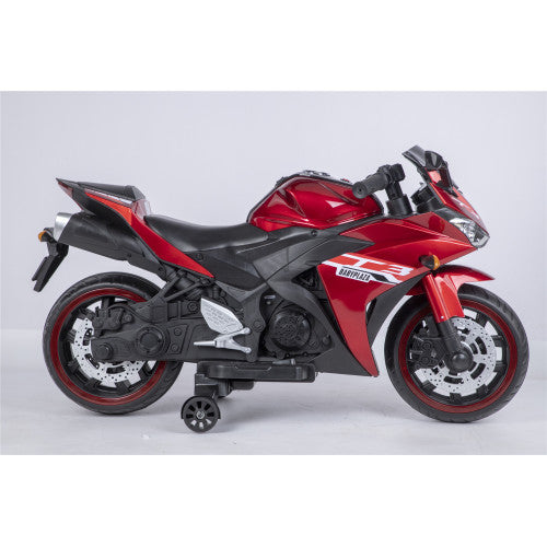 Red and black toy motorcycle on a light gray background