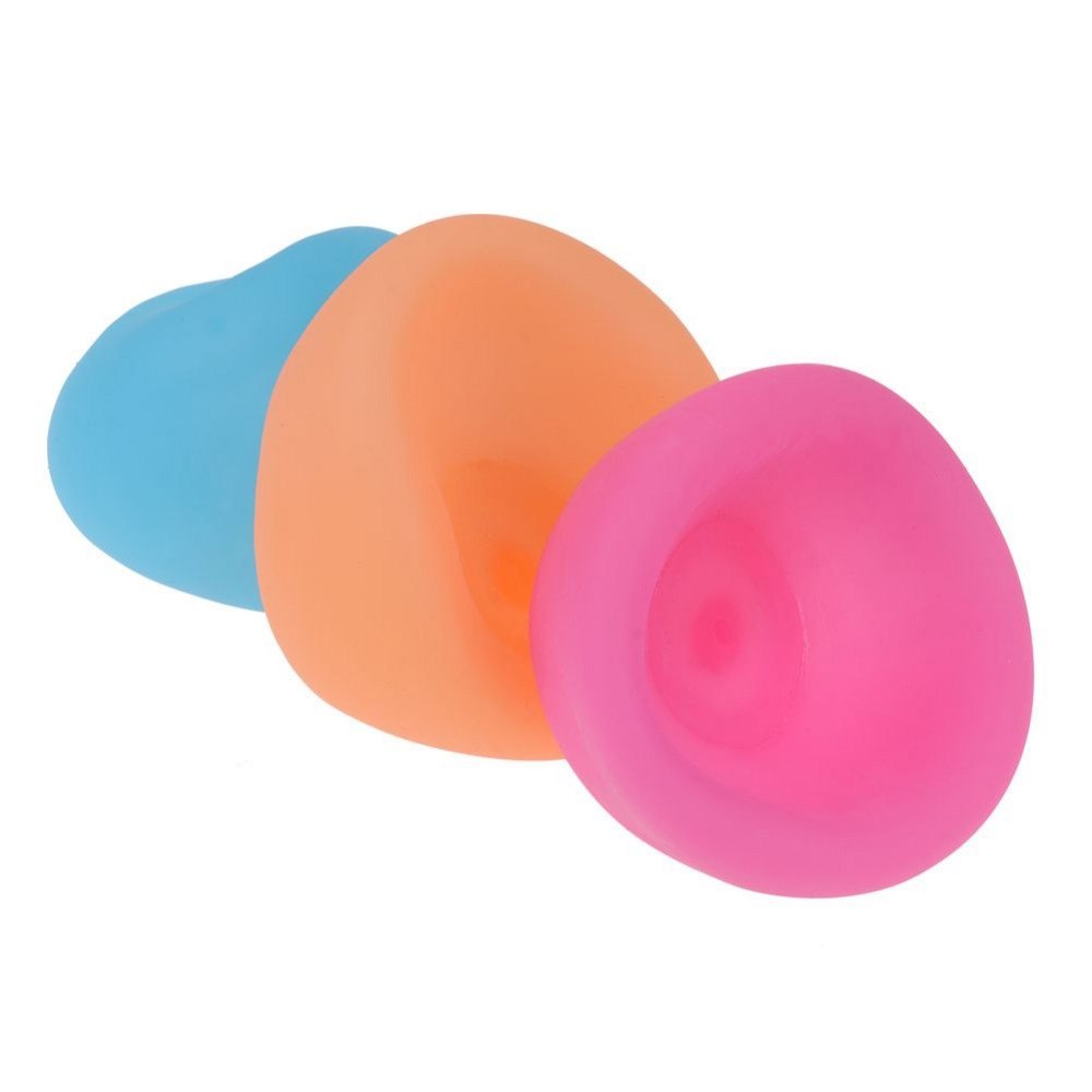 Three colorful silicone cups on a white background