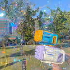 Toy bubble gun with bubbles in an outdoor setting