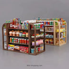 Miniature grocery store display with various products on shelves against a gray background.