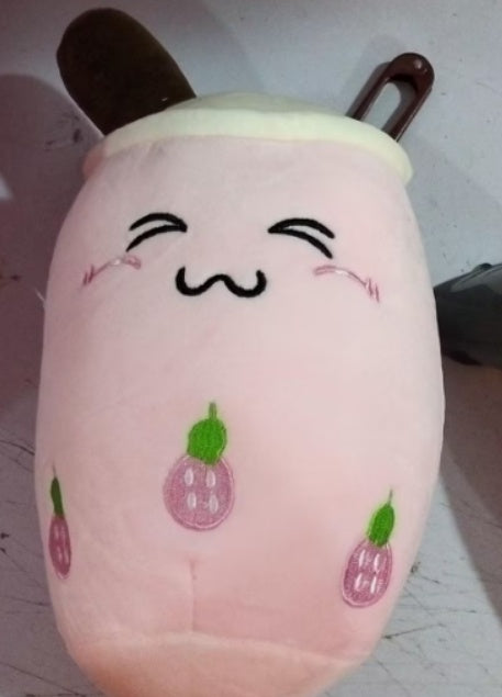 Plush toy with a face design on a white background
