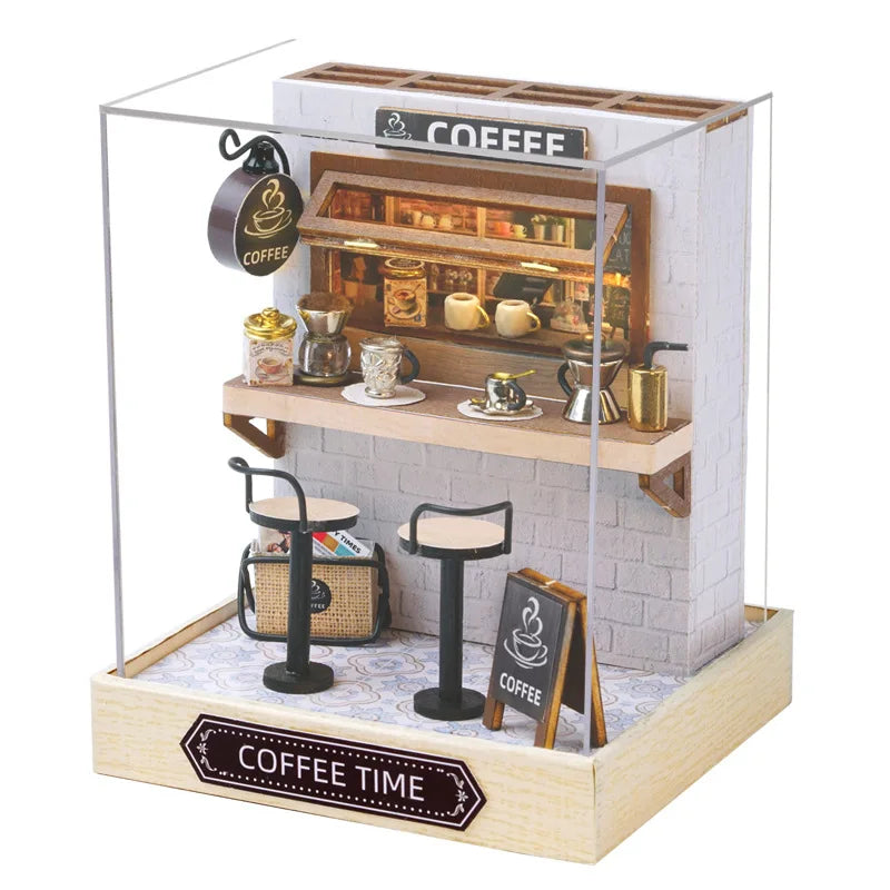 Miniature coffee shop set with 'COOFFEE' sign and 'COFFEE TIME' display case.
