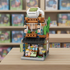 Mini LOZ block set with a detailed model and packaging, showing dimensions.