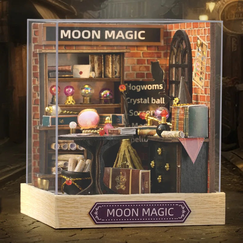 Decorative display box labeled 'Moon Magic' with various items inside.